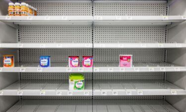 Many families with new babies in the United States are still having trouble finding baby formula. Baby formula shelves sit nearly empty at a store in Washington
