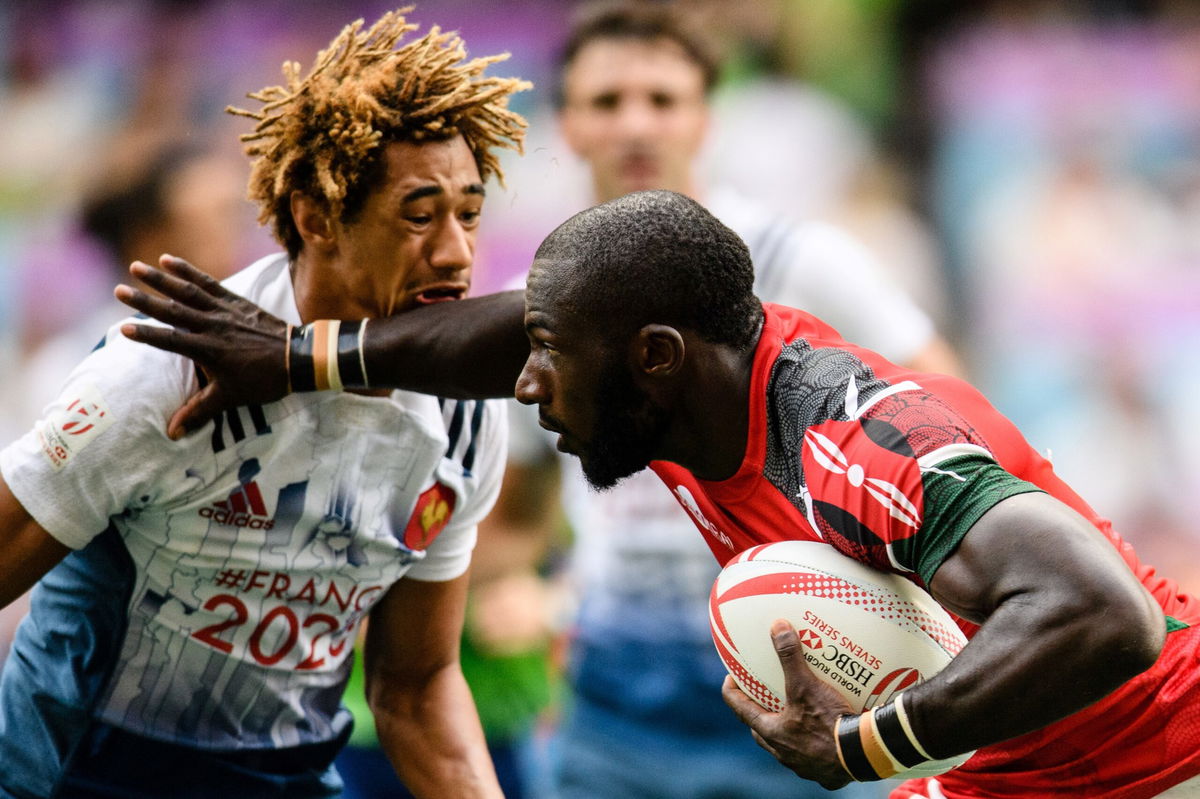 <i>Anthony Wallace/AFP/Getty Images</i><br/>Dennis Ombachi (right)