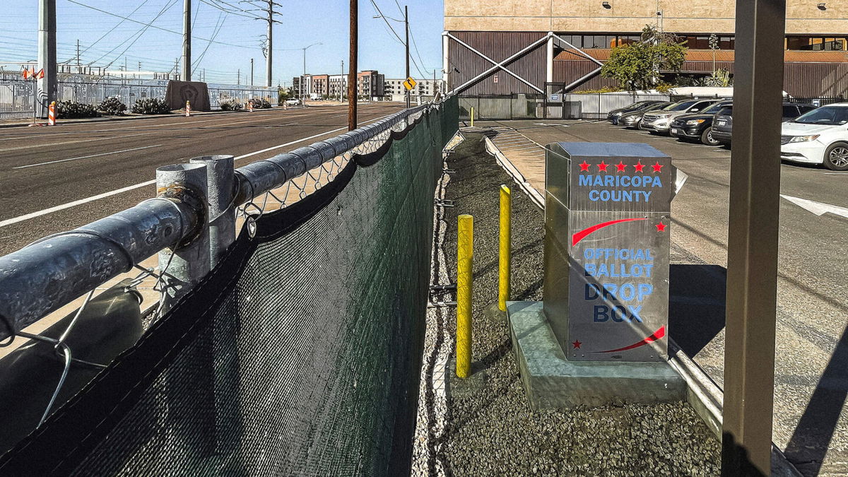 <i>Olivier Touron/AFP/Getty Images</i><br/>Fences surround the Maricopa County Tabulation and Elections Center in Phoenix