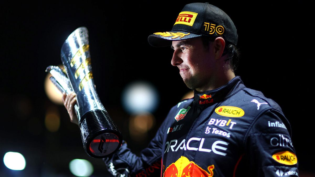 <i>Dan Istitene/Formula 1/Getty Images</i><br/>Race winner Sergio Perez of Mexico and Oracle Red Bull Racing celebrates on the podium during the F1 Grand Prix of Singapore at Marina Bay Street Circuit on October 2 in Singapore