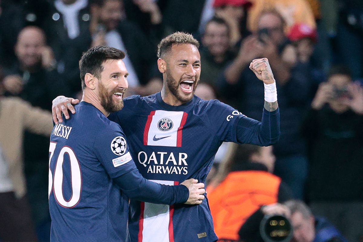 <i>GEOFFROY VAN DER HASSELT/AFP/AFP via Getty Images</i><br/>Messi and Neymar celebrate PSG's third goal in a dominant display against Israeli side Maccabi Haifa.