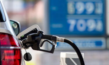 A sign displayed gasoline prices at six and seven dollars at a Chevron station in Cathedral City