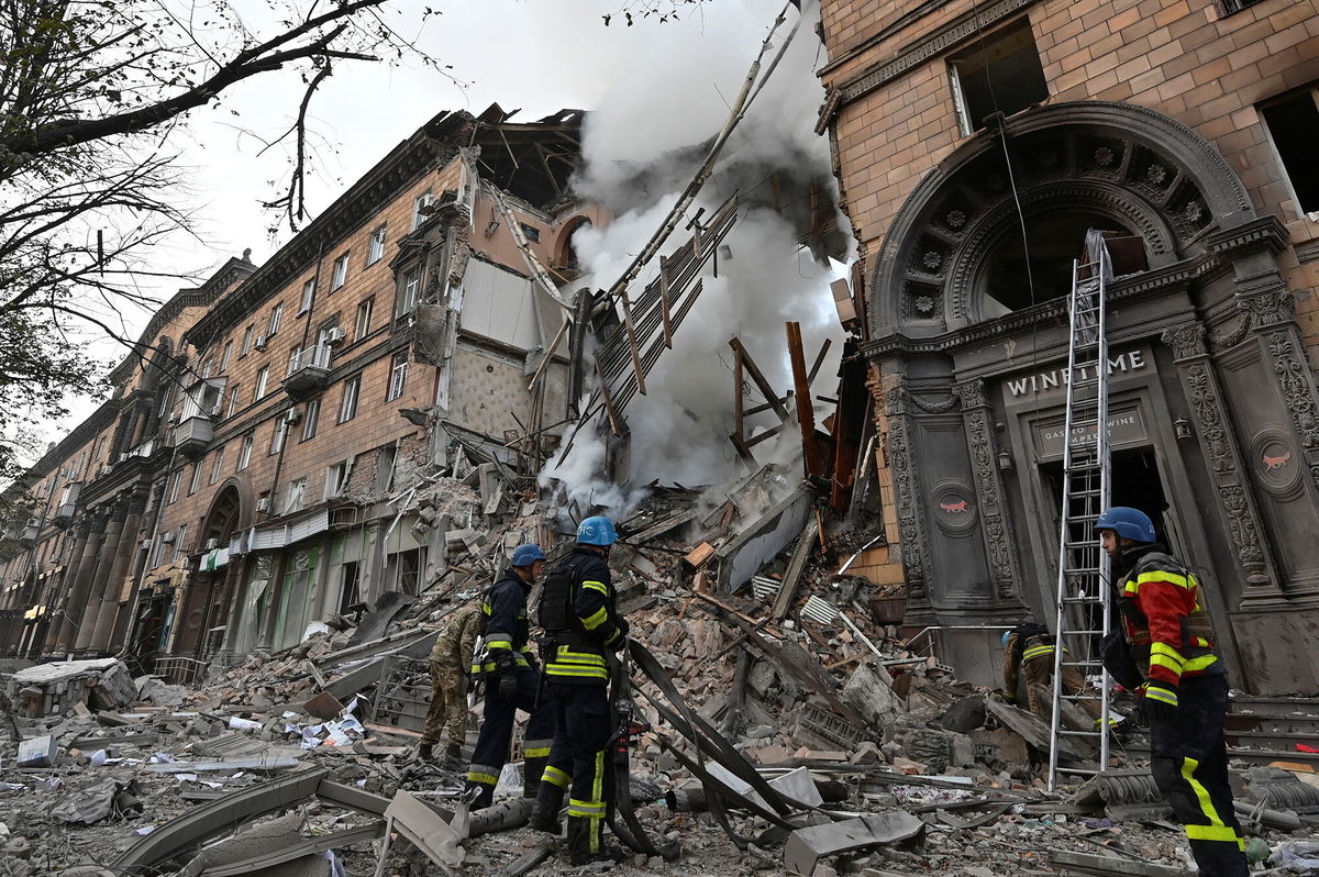 <i>Reuters</i><br/>Russia carried out a deadly salvo of missile attacks on the southern Ukrainian city of Zaporizhzhia on October 6. Rescuers are seen here working at a site of a residential building heavily damaged the strike.