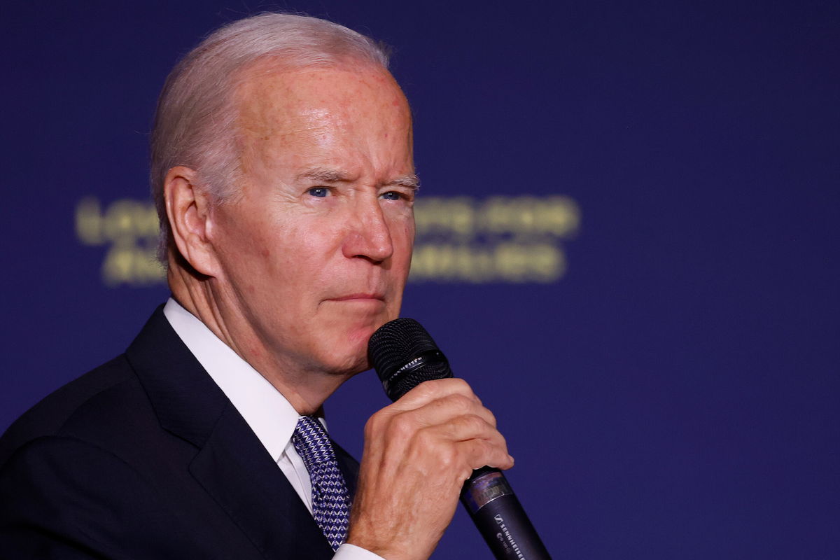 <i>Anna Moneymaker/Getty Images/FILE</i><br/>President Joe Biden gives remarks on student debt relief at Delaware State University on October 21. The Justice Department told an appeals court on October 24 that the Biden administration should be allowed to carry out its student debt relief plan as an appeal plays out.