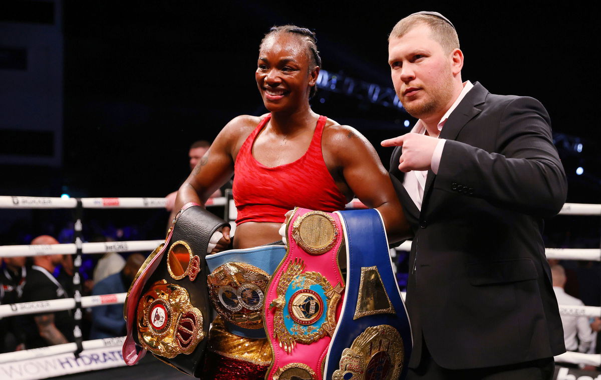 <i>Huw Fairclough/Getty Images</i><br/>Claressa Shields celebrates victory with her belts after the WBO