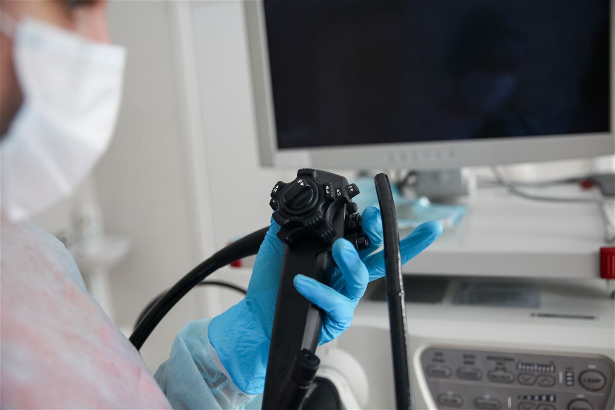 <i>Adobe Stock</i><br/>A new study questions the effectiveness of colonoscopies for cancer screening. Pictured is an endoscopist with an endoscope in his hands.