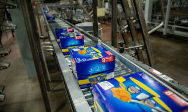 Packages of Easy Mac Macaroni & Cheese Cups move along the production line on March 27