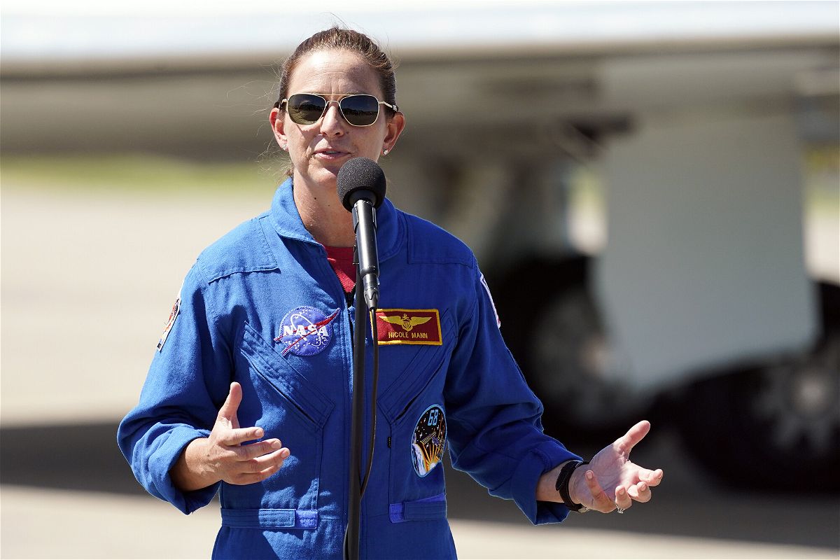 <i>John Raoux/AP</i><br/>NASA astronaut Nicole A. Mann speaks during a news conference at the Kennedy Space Center in Florida on October 1.  Mann will be the first Native American woman ever to travel to Earth's orbit.