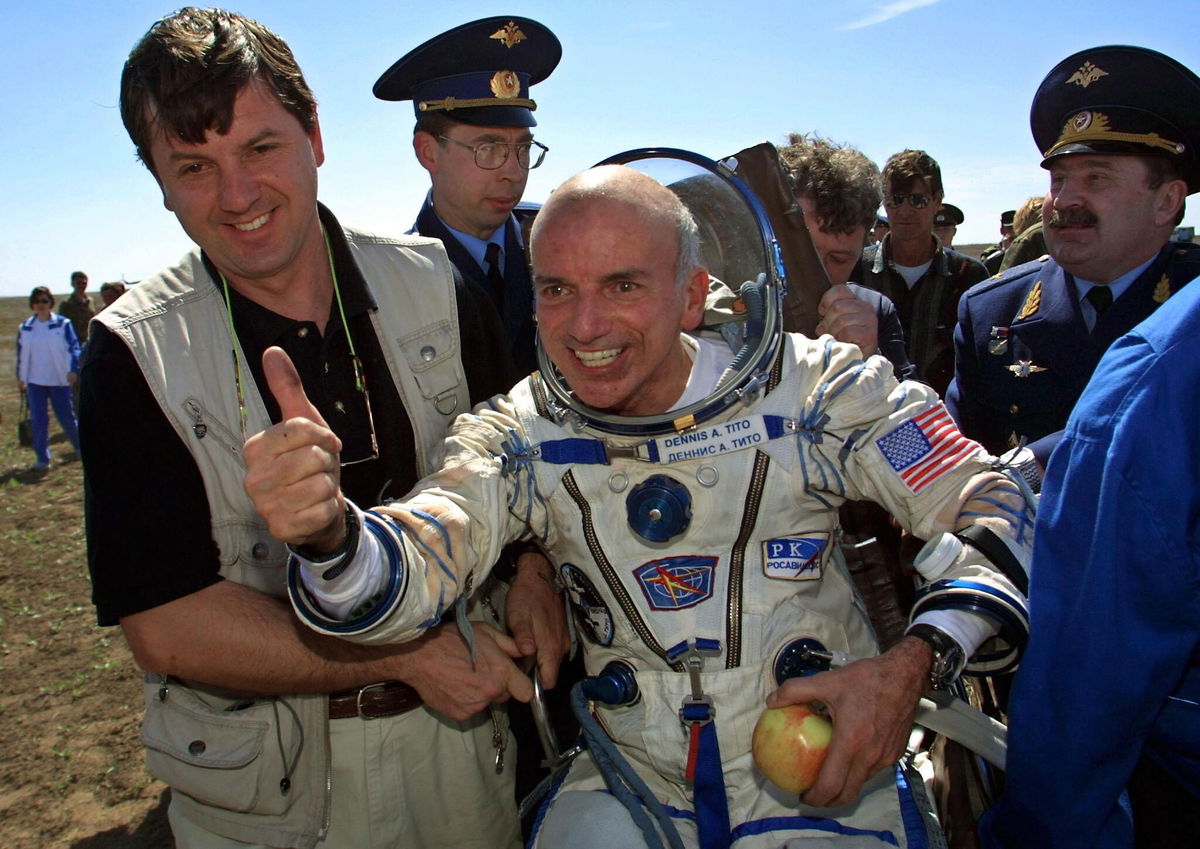 <i>Alexander Nemenov/AFP/Getty Images</i><br/>Dennis Tito and his wife plan to take a lunar expedition that will last roughly a week. Tito here celebrates after landing near the Kazakh town of Arkalyk following his trip as the world's first space tourist in 2001.
