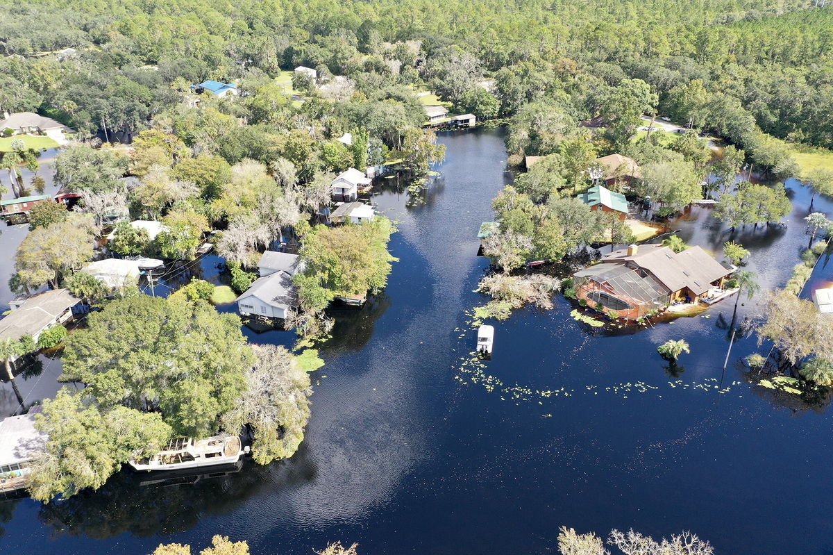 <i>Chris Fau</i><br/>Forecasters at the National Weather Service are warning of several weeks of flooding as the St. Johns slowly drains.