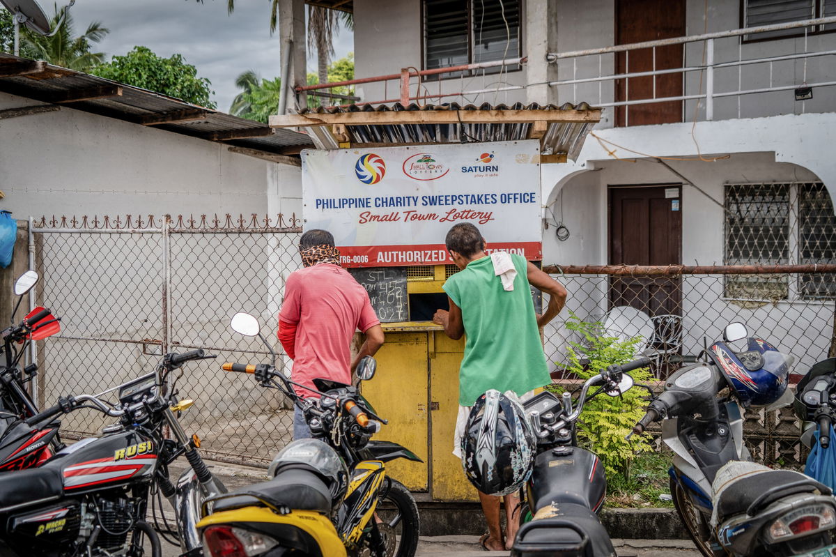 <i>Matt Hunt/SOPA Images/LightRocket/Getty Images</i><br/>A 236 million peso ($4 million) lottery jackpot shared among a record number of more than 400 winners has sparked questions in the Philippine Senate. Lottery hopefuls in Cebu