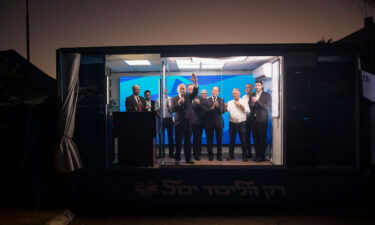 Netanyahu speaks to supporters in a modified truck during a campaign event this month.