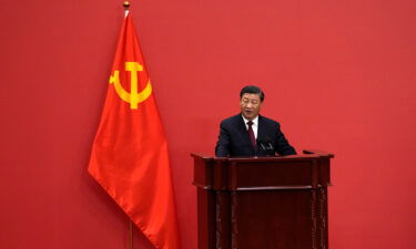 Chinese President Xi Jinping speaks at an event to introduce new members of the Politburo Standing Committee at the Great Hall of the People in Beijing