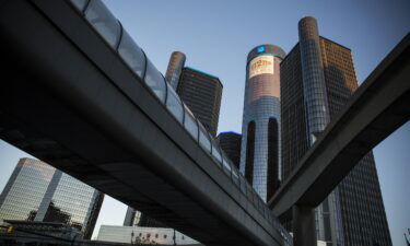 The General Motors logo sits atop the company's headquarters in September 2013 in Detroit