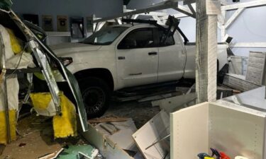 Two men were arrested after a stolen truck was smashed into a Vancouver