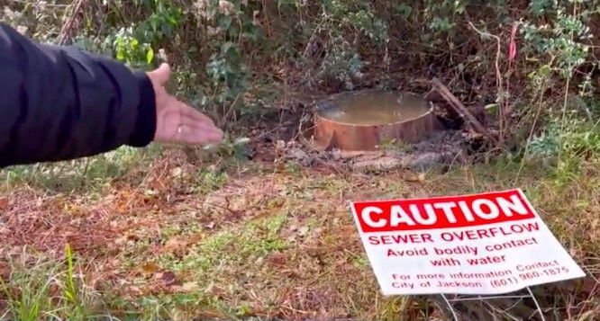 <i>WAPT</i><br/>A west Jackson family is dealing with a smelly case of raw sewage in their backyard. A sign that says