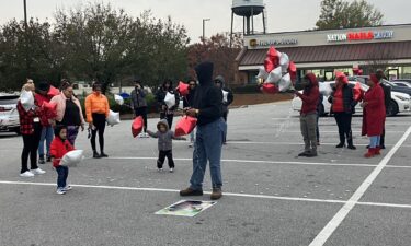 The family of 18-year-old Ni'Keem Omar Hargrove held a vigil in the parking lot of a Henry County Kroger where he was shot and killed.