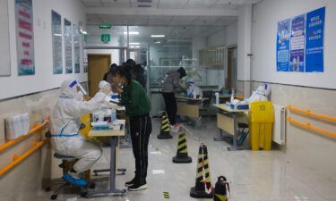China reports first Covid-19 deaths in nearly 6 months as cases spike. Pictured is a Covid-19 test center  on November 20