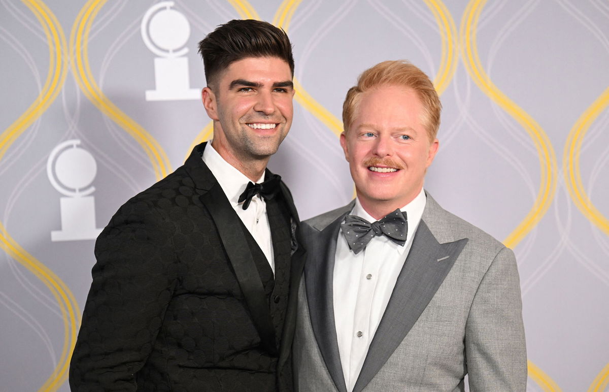 <i>Angela Weiss/AFP/Getty Images</i><br/>Jesse Tyler Ferguson and husband Justin Mikita (L)