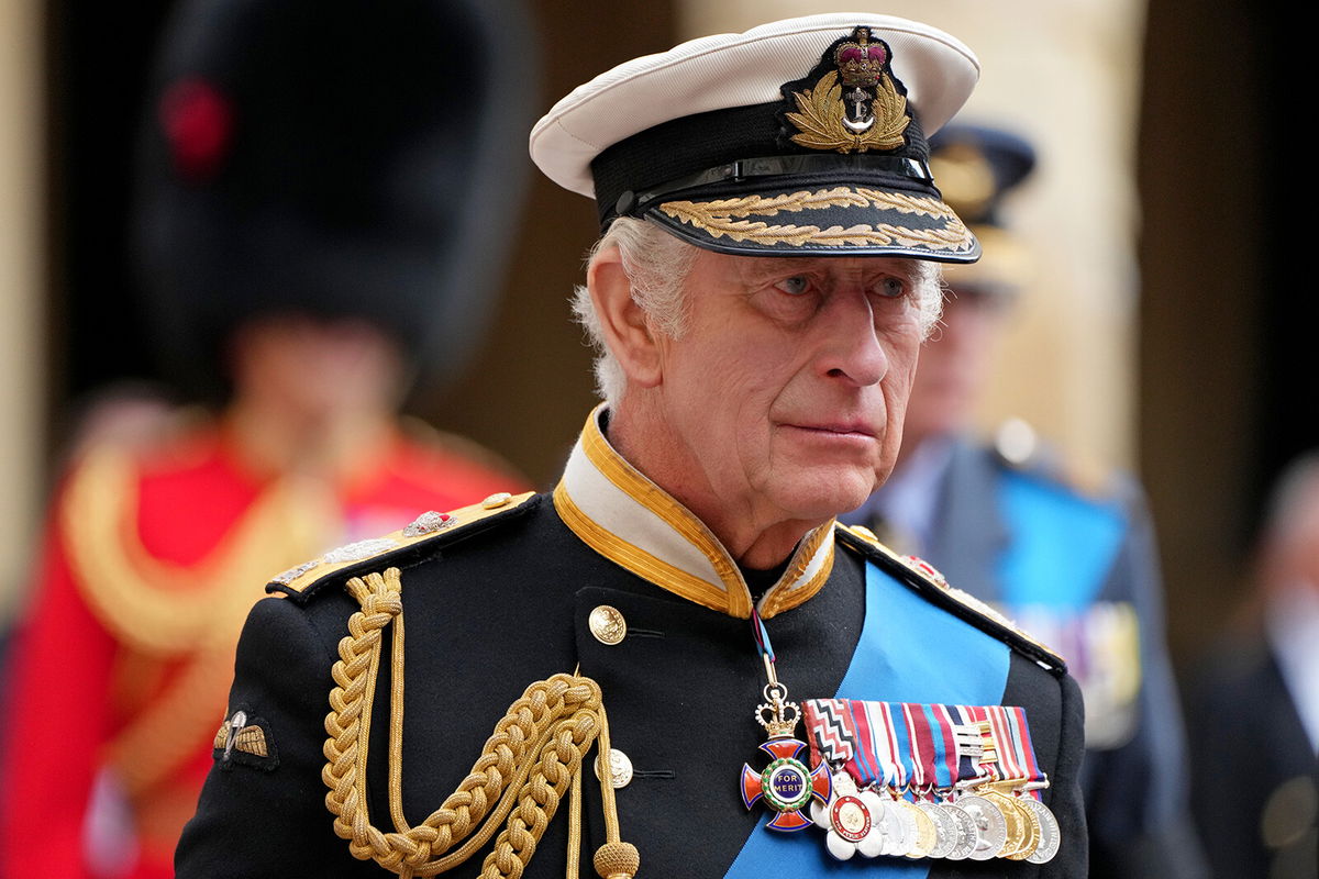 <i>Jon Super/WPA Pool/Getty Images</i><br/>King Charles III follows the hearse with the coffin of Queen Elizabeth II moving towards St. George's Chapel at Windsor Castle during the State Funeral of Queen Elizabeth II on September 19 in Windsor