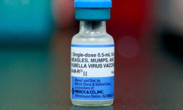 A file photo shows a vial of a measles