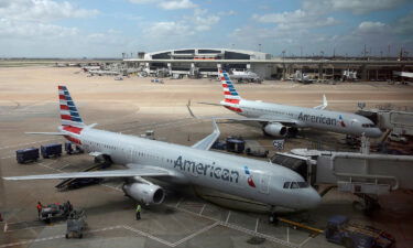 All flights to Dallas-Fort Worth International Airport are being held at their departure airports due to an earlier fire at the airport's fuel farm