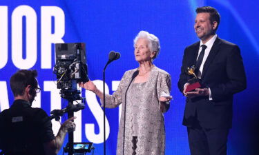 Singer Angela Álvarez accepts the award for best new artist on stage during the 23rd Annual Latin Grammy awards in Las Vegas