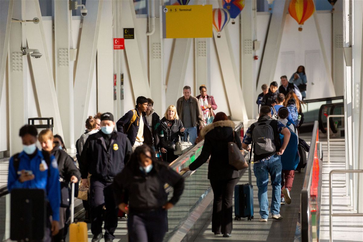 <i>Michael Nagle/Bloomberg/Getty Images</i><br/>Travelers at Terminal 5 at John F. Kennedy International Airport (JFK) ahead of the Thanksgiving holiday in New York