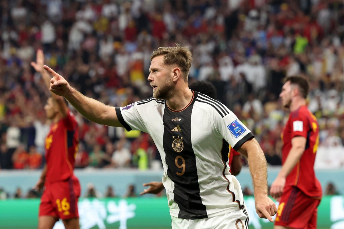 <i>Alexander Hassenstein/Getty Images Europe/Getty Images</i><br/>Niclas Füllkrug celebrates scoring the equalizer.