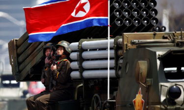 Soldiers hold weapons while seated on a vehicle carrying rockets in Pyongyang in April 2017. North Korea fired at least one unidentified ballistic missile on November 3.