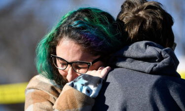 Jessy Smith Cruz embraces Jadzia Dax McClendon the morning after a mass shooting at Club Q in Colorado Springs