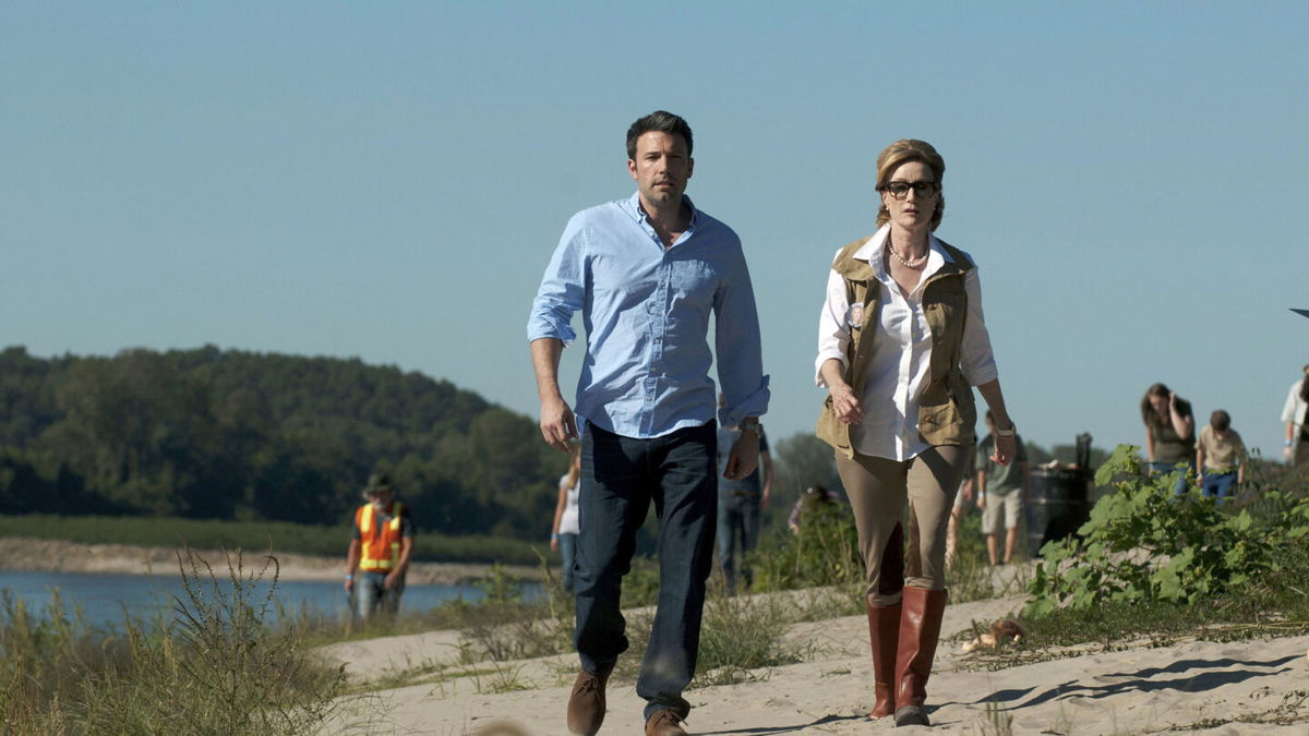 <i>Merrick Morton/20th Century Fox//Shutterstock</i><br/>Banes seen here with Ben Affleck in 2014's 'Gone Girl.'