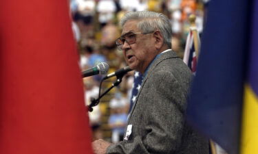 Hiroshi Miyamura speaks to the crowd after receiving the Congressional Medal of Honor for his service in Korean War at the 29th Annual Bolder Boulder 10K road race.