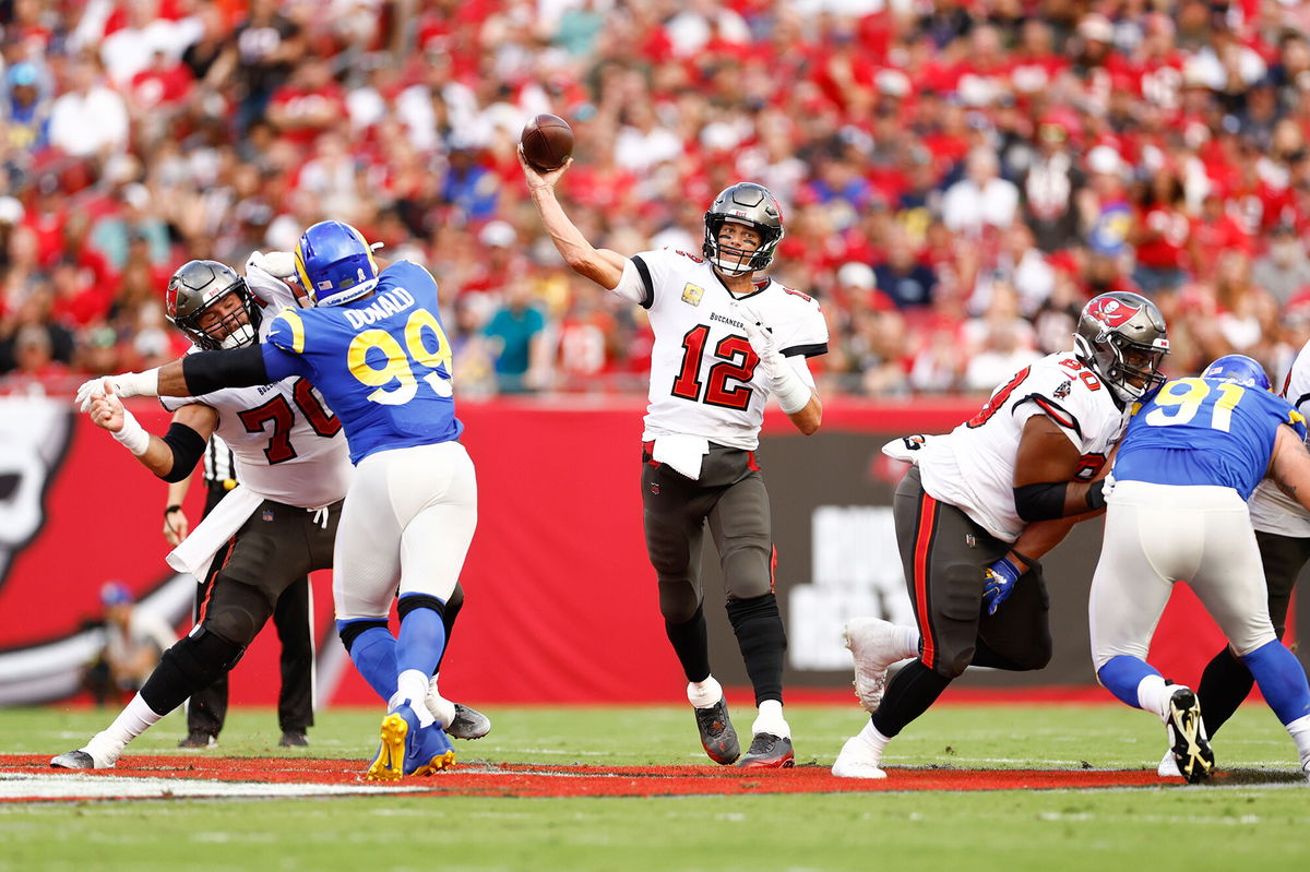 <i>Douglas DeFelice-USA TODAY Sports/Reuters</i><br/>Brady looks to pass the ball against the Rams.