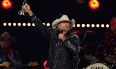 Alan Jackson accepts the Willie Nelson lifetime achievement award during the 56th Annual CMA Awards in Nashville