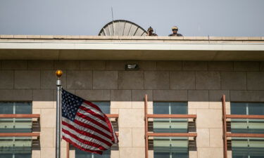 US soldiers stand guard on the roof of the US Embassy in Port-au-Prince