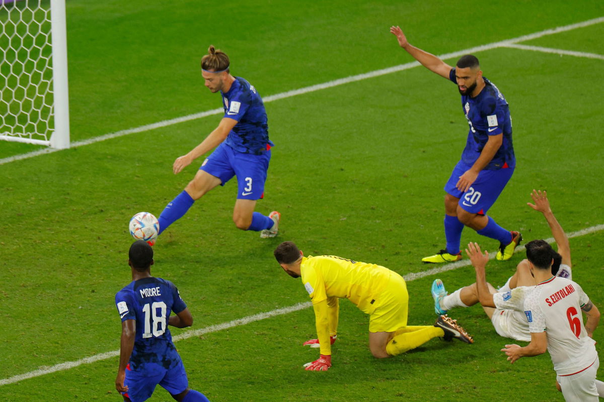 <i>Odd Andersen/AFP via Getty Images</i><br/>Walker Zimmerman clears the ball near the end of the USMNT's World Cup game against Iran.