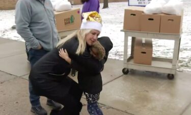 A Genesee County school is spreading holiday cheer while helping provide food for those in need. “The need is always there for our families