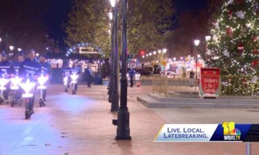 Some Baltimoreans tried a new way to share the Hanukkah spirit Sunday night as Broadway Square filled up with LED menorahs and life-size dreidels on wheels.