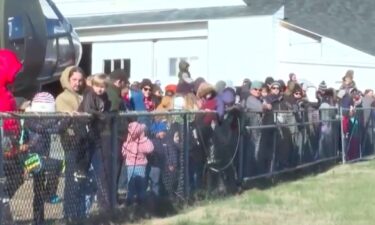 The Arkansas Air & Military Museum offered a unique way to meet Santa Claus on Saturday. Claus and his elves jumped out of a plane as spectators watched.