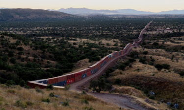 A view of shipping containers from the border wall on the frontier with Mexico in Cochise County