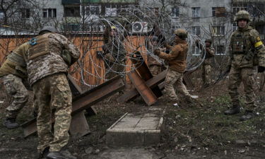 Ukrainian President Volodymyr Zelensky thrusts frontline city and a symbol of Ukraine's resistance onto the world stage in US visit. Ukrainian soldiers prepare barricades in Bakhmut