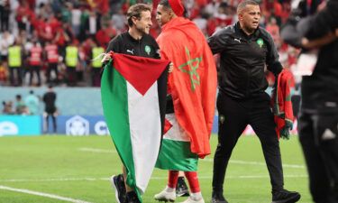 The Moroccan team displayed a Palestinian flag after defeating Spain at the World Cup.