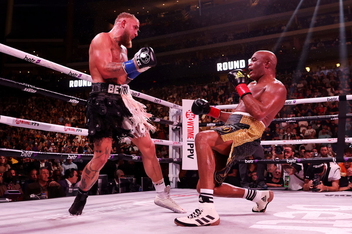 <i>Christian Petersen/Getty Images North America/Getty Images</i><br/>Jake Paul knocks down Anderson Silva during their cruiserweight bout at Desert Diamond Arena on October 29 in Glendale