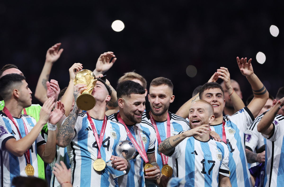 <i>Clive Brunskill/Getty Images Europe/Getty Images</i><br/>Argentina's players were overcome by emotion after lifting the World Cup trophy.