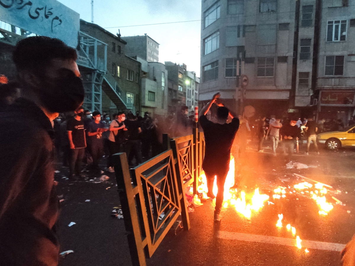 <i>AFP/Getty Images</i><br/>Iranian demonstrators take to the streets of the capital Tehran during a protest for Mahsa Amini