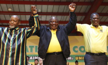 South African President Cyril Ramaphosa (center) recently survived a move to start impeachment proceedings against him.