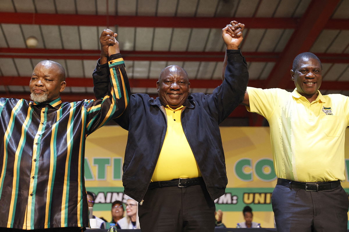 <i>Phill Magakoe/AFP/Getty Images</i><br/>South African President Cyril Ramaphosa (center) recently survived a move to start impeachment proceedings against him.