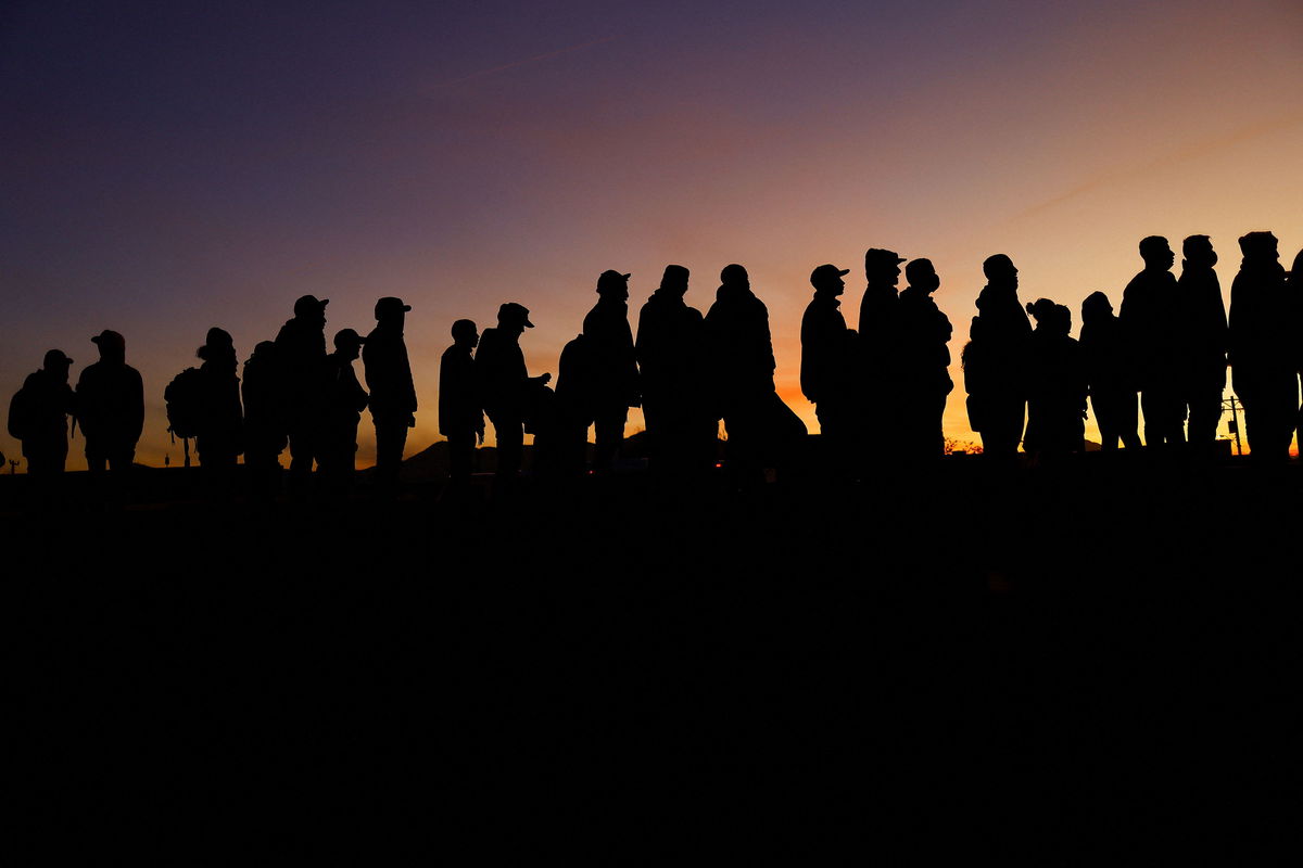 <i>Jose Luis Gonzalez/Reuters</i><br/>The Biden administration is still bracing for the end of a Trump-era border restriction even after the chief justice of the Supreme Court temporarily paused the end of the program. Venezuelan migrants stand near the Rio Bravo river on December 17.