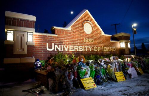 Letters from surviving roommates were read at a church memorial service for slain University of Idaho students on Friday. Pictured is  makeshift memorial for the four students at the University of Idaho campus sign.